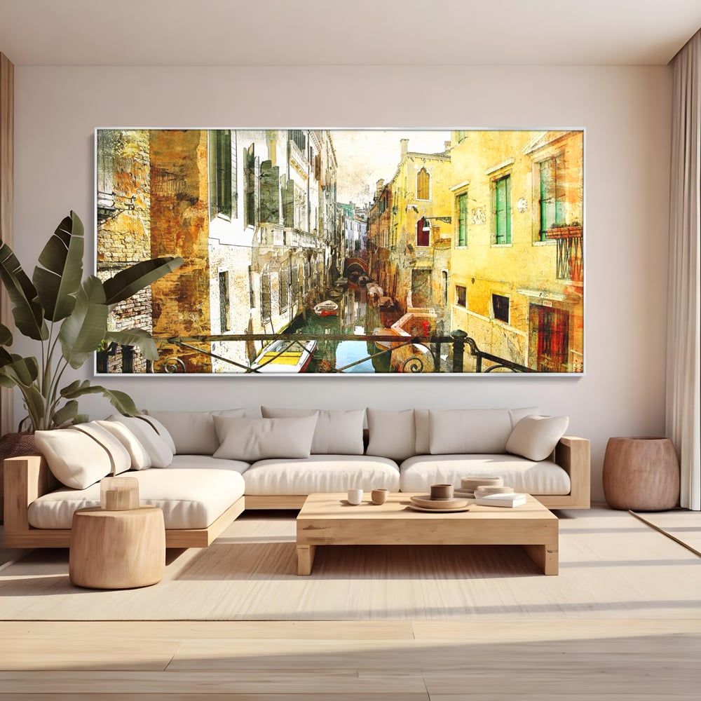 Tablou canvas cu tablou canvas cu peisaj venetian, in rama de aluminiu argintiu, pe perete intr-un living